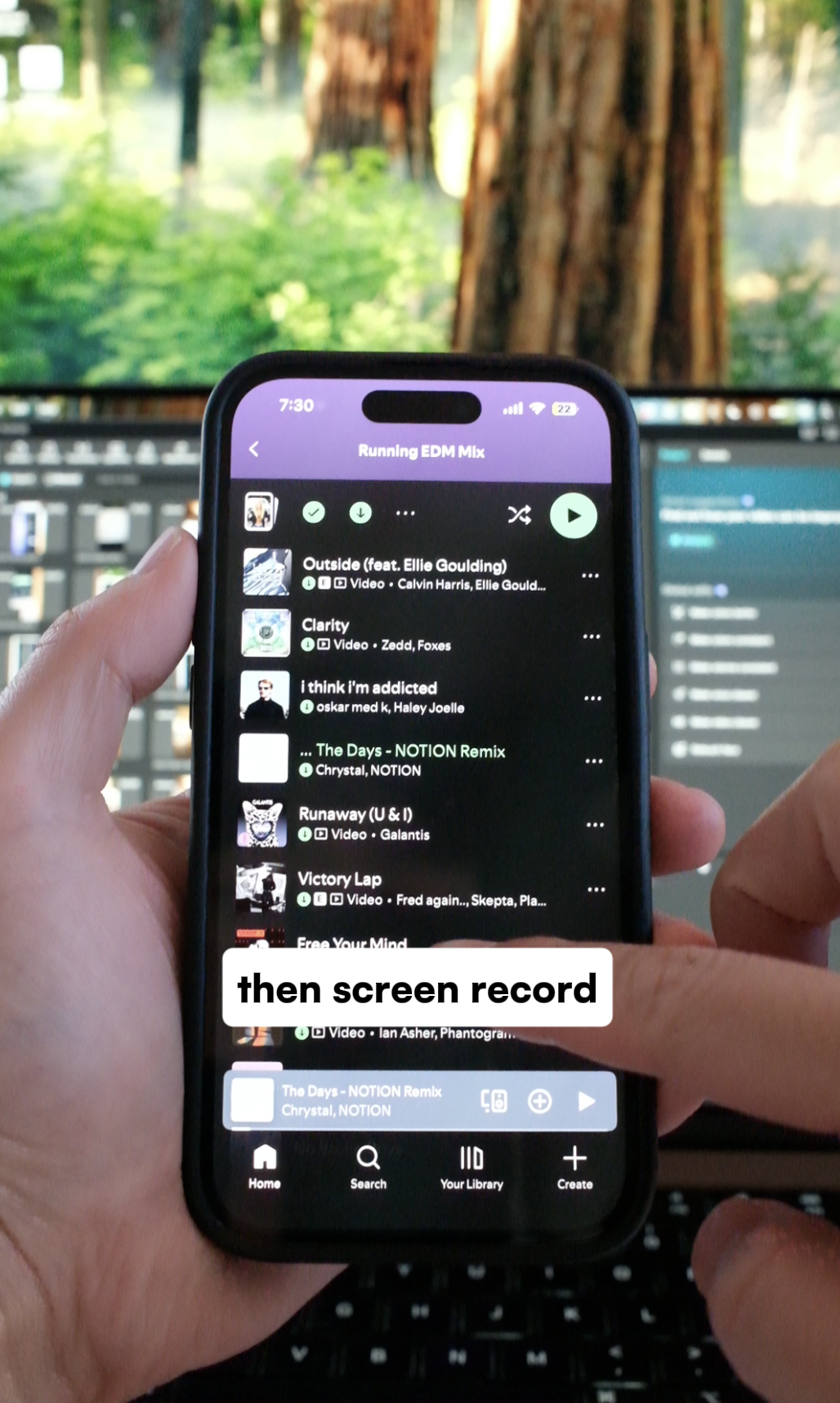 A phone showing a Spotify playlist, ready to screen record the scrolling.
